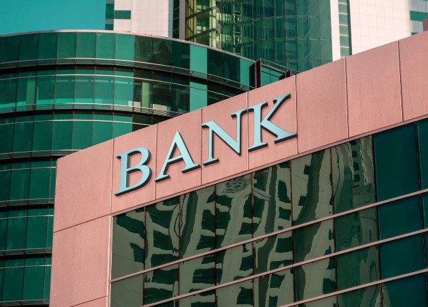 bank sign on glass wall business | Productivity Tips Every Commercial Real Estate Broker Should Follow | productivity tips