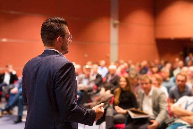 speaker giving talk business conference event | Overcoming Obstacles | Ways To Get Through A Road Block | overcoming obstacle