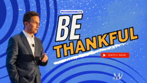 Rod Santomassimo of the Massimo Group in a great suit on a blue background with snow wants you to Be Thankful in his latest vlog post.
