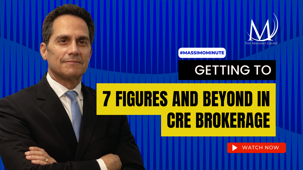 A man in a power suit stands with his arms crossed against a blue background exemplifying power, energy and confidence. Getting to 7-figures and beyon in CRE brokerage is the title of the slide.