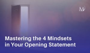 A presentation slide with a deep purple and misty lavender gradient background. On the left, a white wooden door stands slightly ajar, revealing a bright, glowing white light from within. On the top right is a minimalist white logo featuring the stylized letters "M" and "V" overlapping inside a circle. Large, bold white text across the bottom reads, "Mastering the 4 Mindsets in Your Opening Statement."