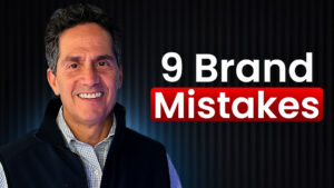 A YouTube video thumbnail with a dark red and black background featuring a close-up photo of Rod Santomassimo on the left, and bold white and red text on the right reading "9 Brand Mistakes".